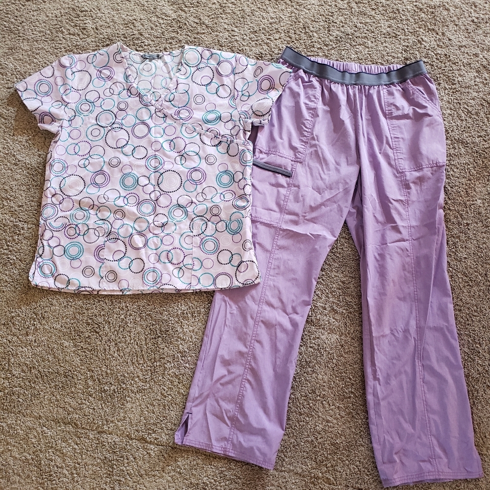 5 scrub tops and 3 scrub bottoms